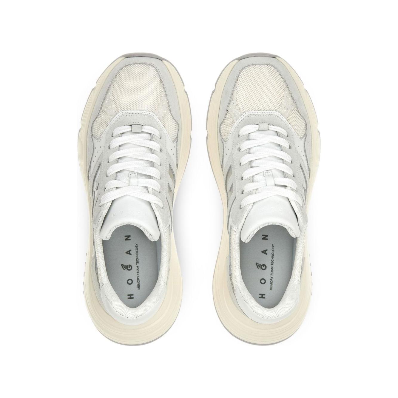 Top view of HOGAN PRE white sneakers featuring silver-tone leather, lace-up design, embossed logo, and rubber sole.
