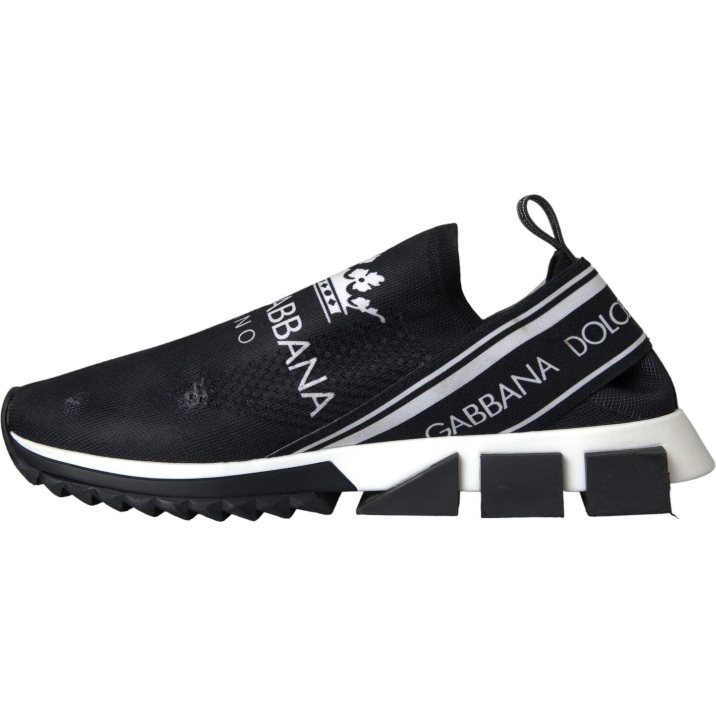 Dolce & Gabbana Sorrento slip-on sneakers in black and white with logo print and rubber sole.