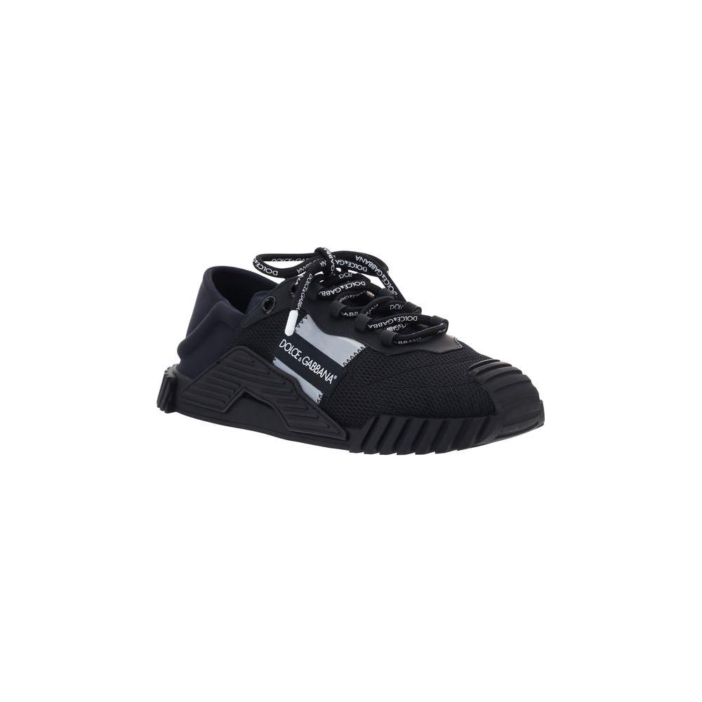 Dolce & Gabbana NS1 sneakers with extended toe, lace-up closure, paneled design, logo plaque, mesh panels, and textured sole.