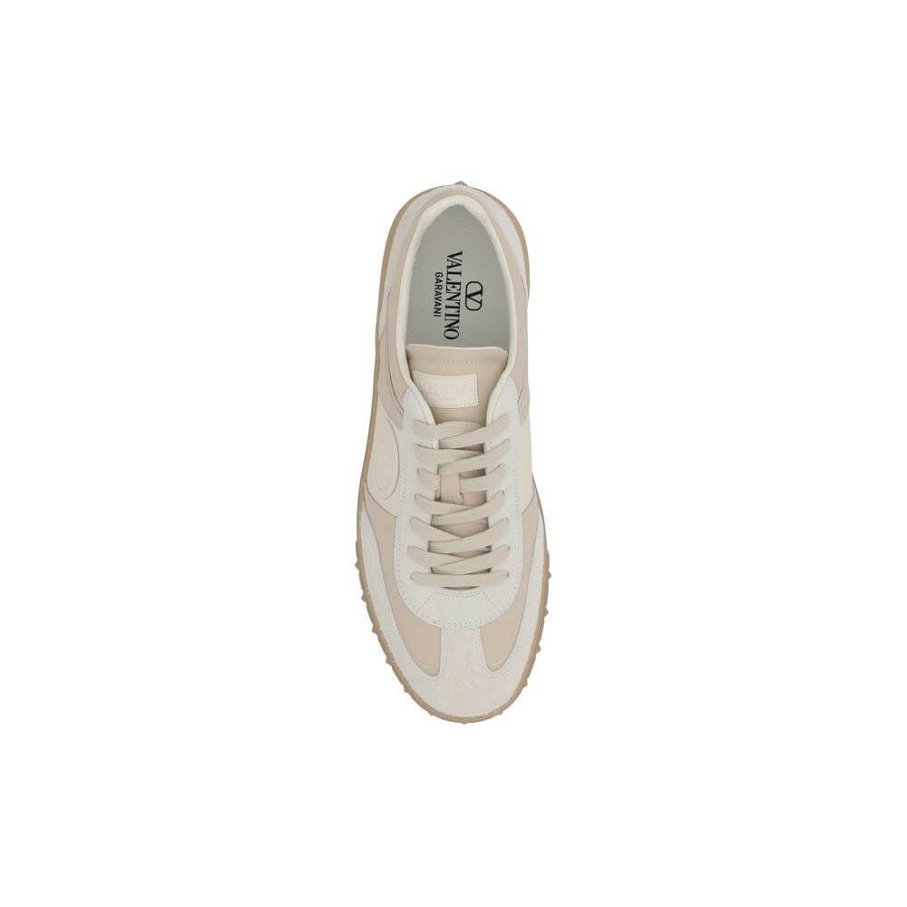 Valentino Garavani Upvillage Sneaker in leather with suede accents, top view showing logoed insole and round toe design.
