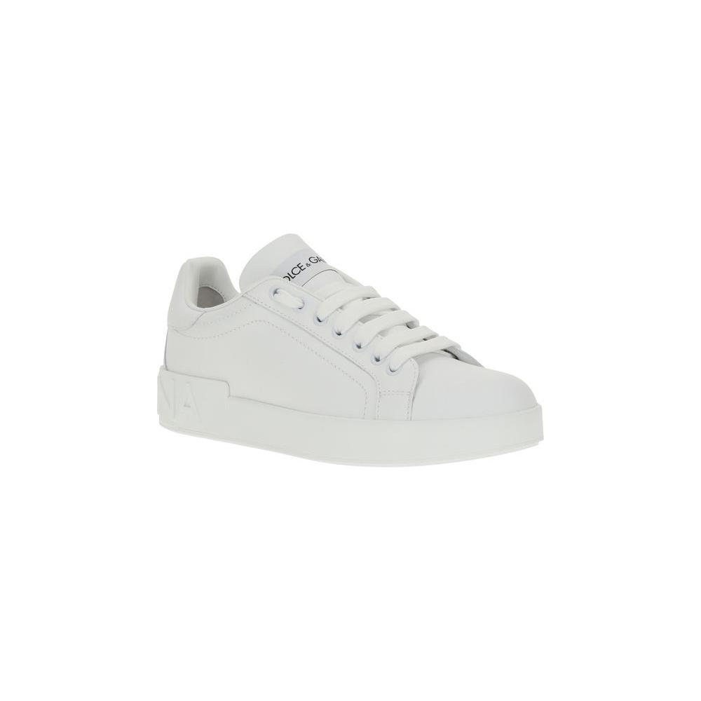 Dolce & Gabbana white leather sneakers with round toe, lace-up front, flat sole with monogram accent, and logoed insole.