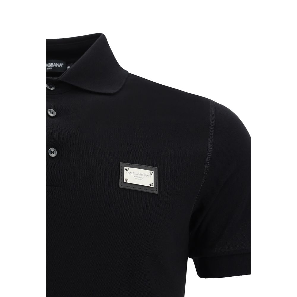 Dolce & Gabbana Black Cotton Polo Shirt with ribbed collar, engraved metal plaque, and tone-on-tone buttons. Made in Italy - AW25 Edition.