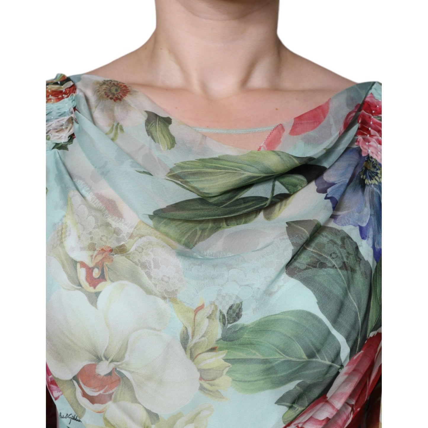 Close-up of Dolce & Gabbana Blue Floral Print Tiered Long Maxi Dress with colorful floral patterns