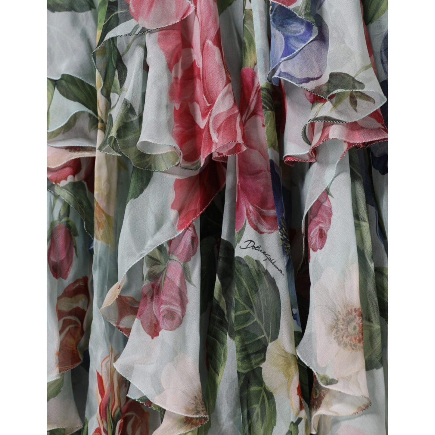 Close-up of Dolce & Gabbana Blue Floral Print Tiered Long Maxi Dress fabric with colorful floral designs and tiered layers.