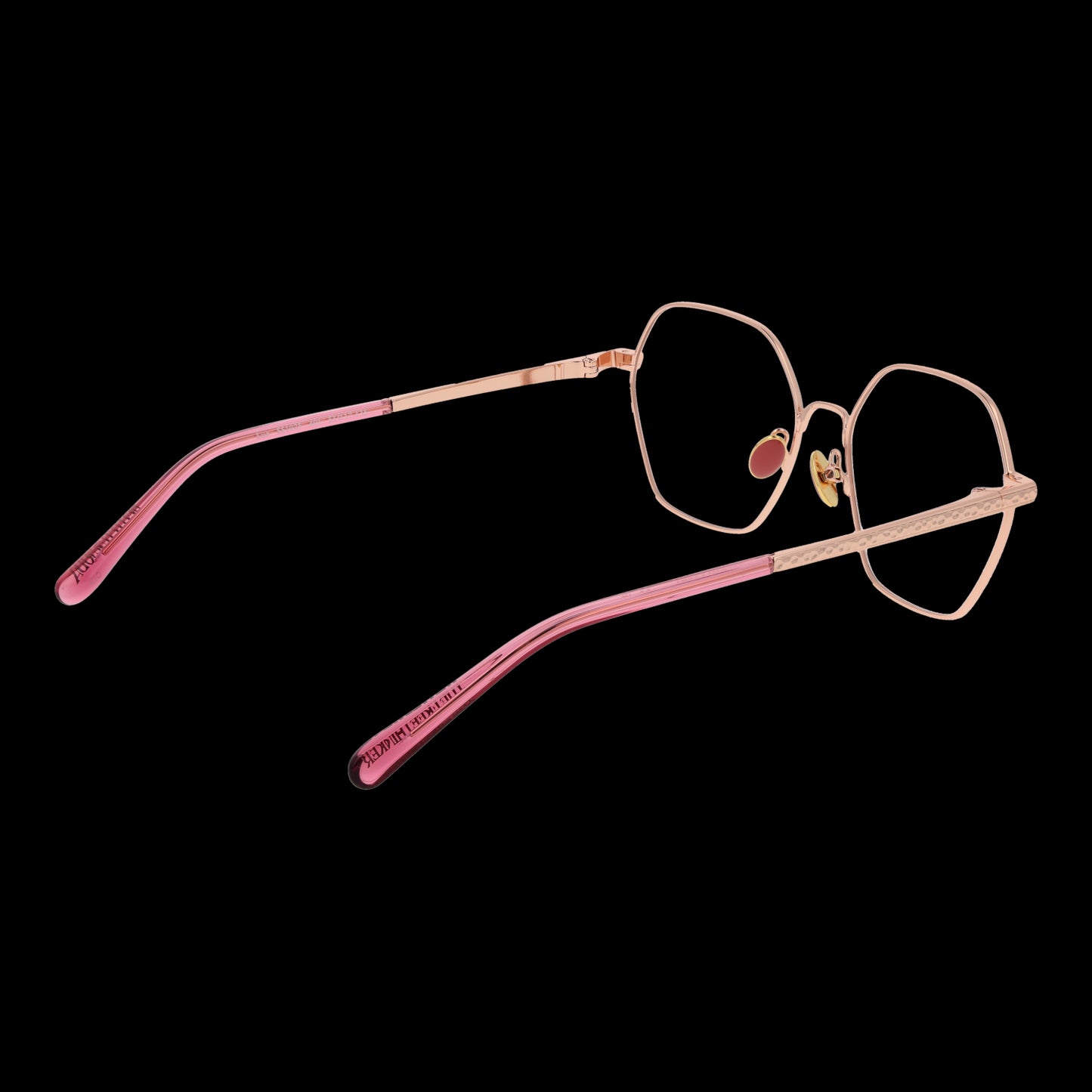 SCOTCH & SODA MOD. SS1025 53401 lady's eyewear with pink and gold frame viewed from the side on black background.
