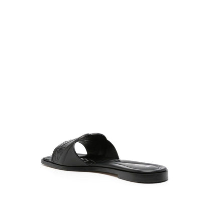 Alexander McQueen logo-embossed leather sandals Sandals