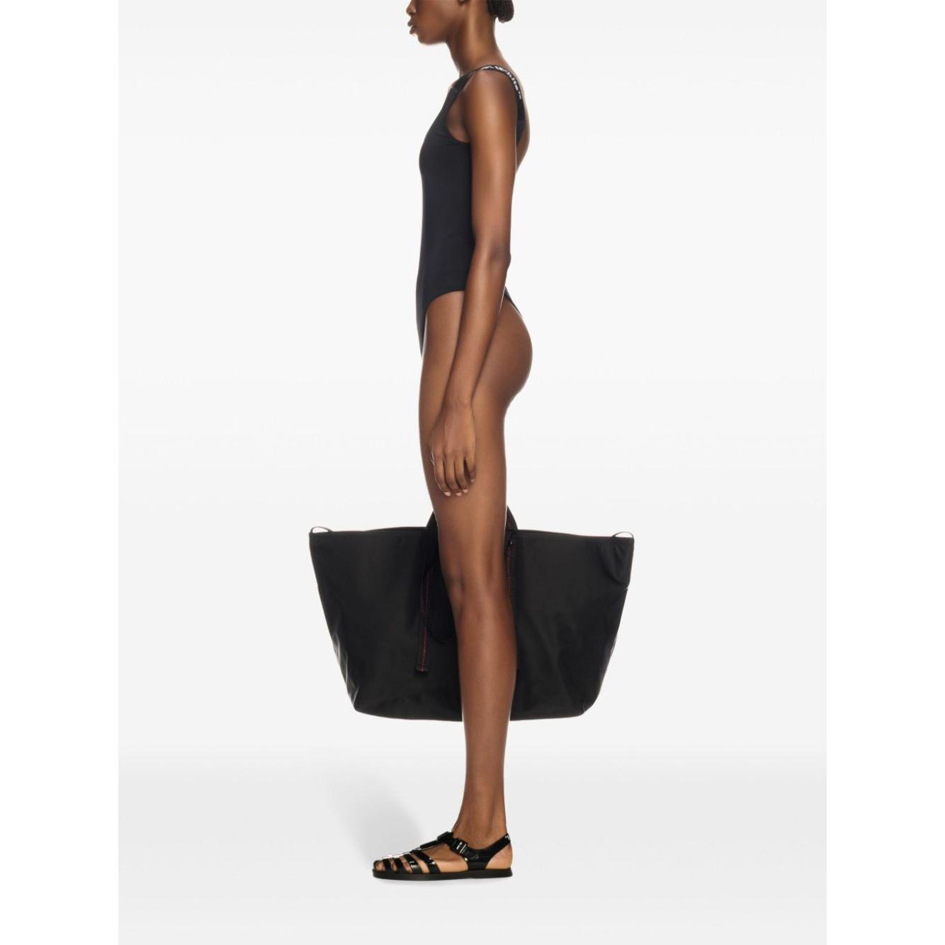 Front view with bag zipped and handles upright.