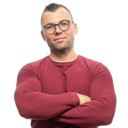 Man wearing Sandro Gray Plastic Glasses (Frames) with a red sweater, standing confidently.
