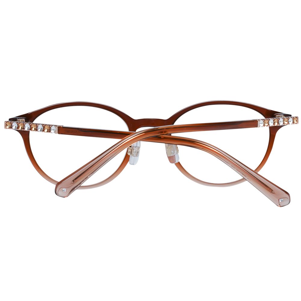 Swarovski Brown Women Glasses Frame with plastic full-rim style, oval shape, demo lenses, and branded case. Size 49-19-145.