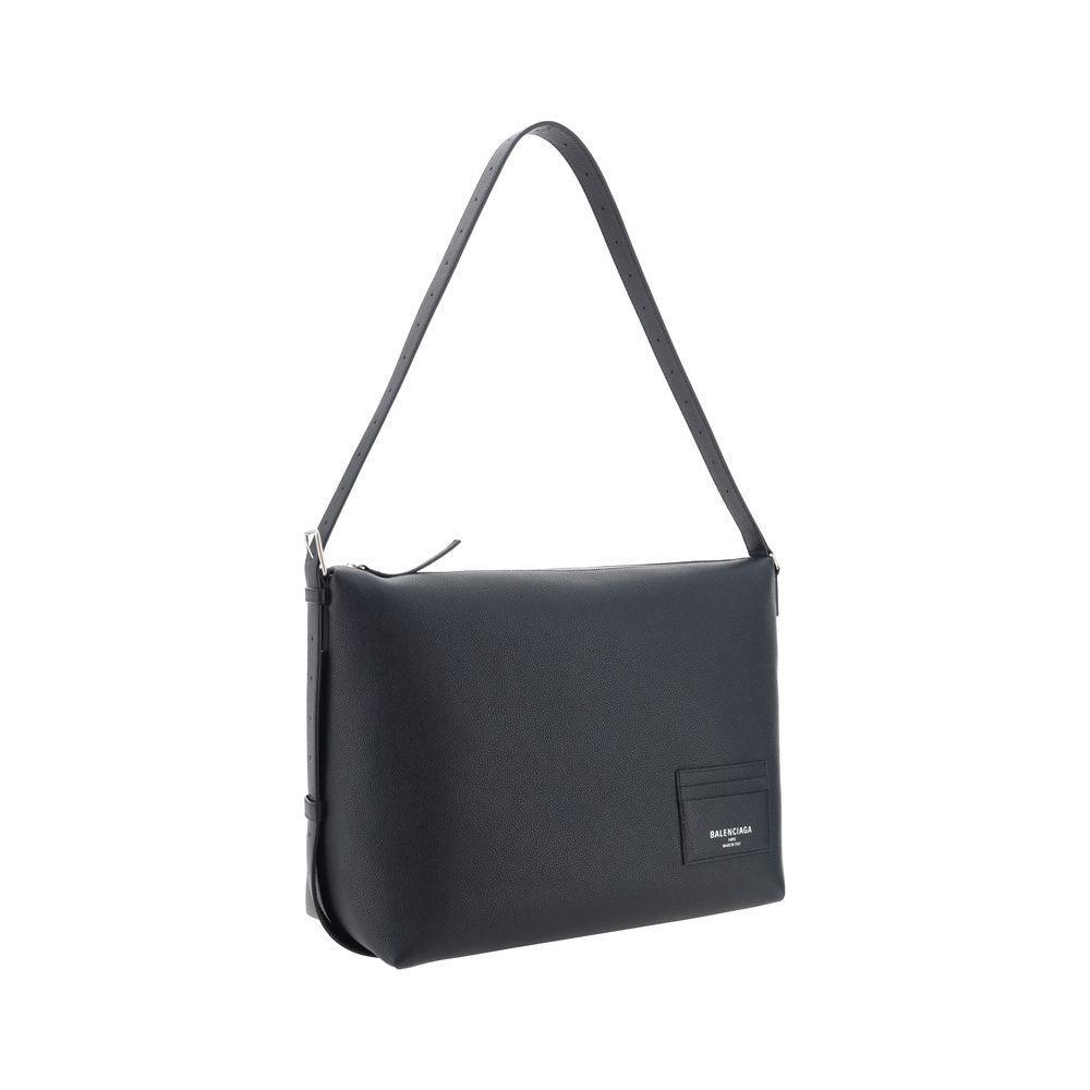 Front view with bag zipped and handles upright.