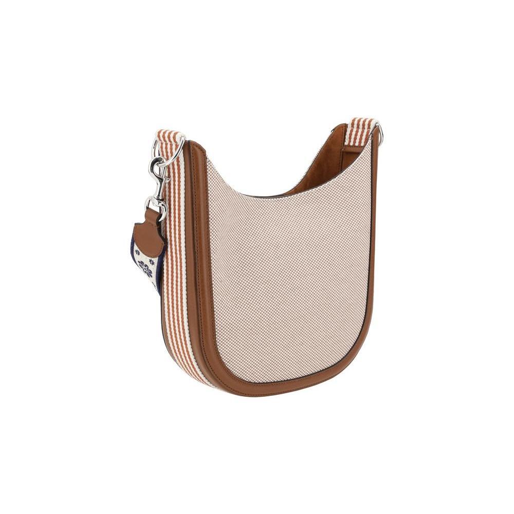 Front view with bag zipped and handles upright.
