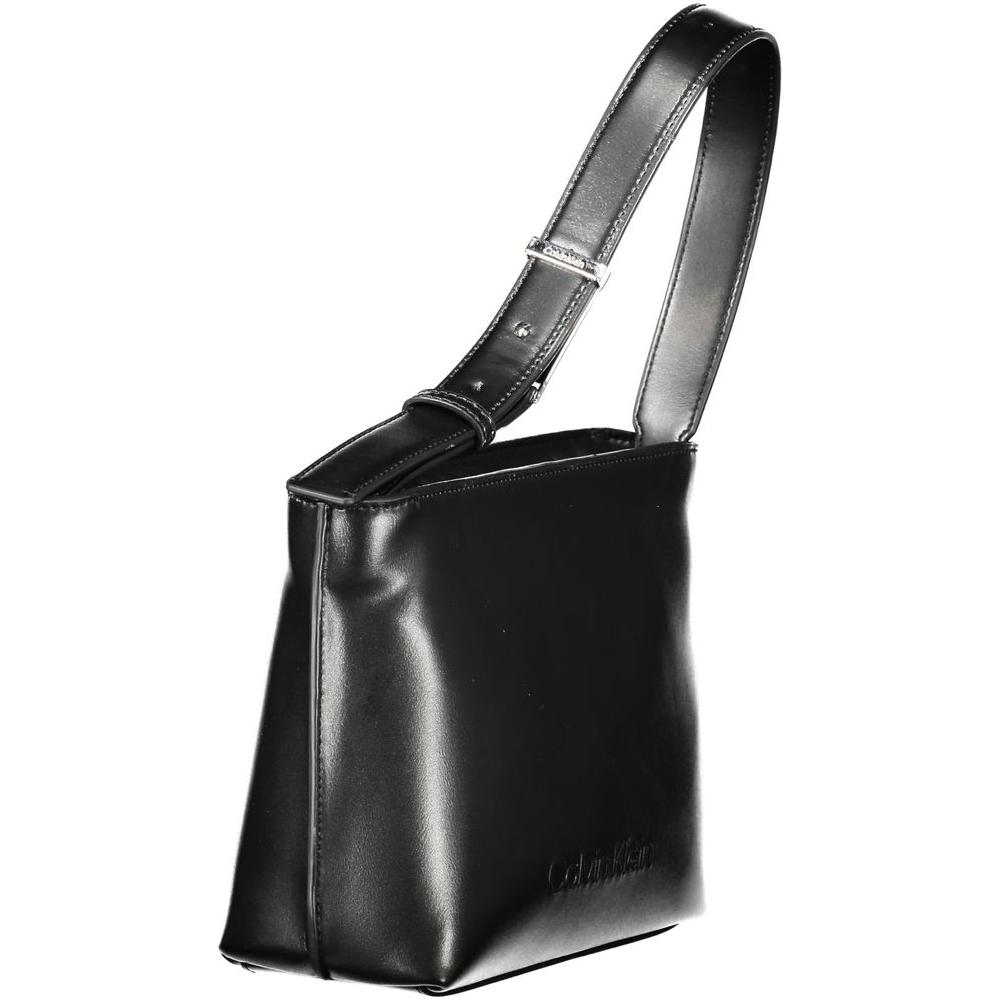 Front view with bag zipped and handles upright.