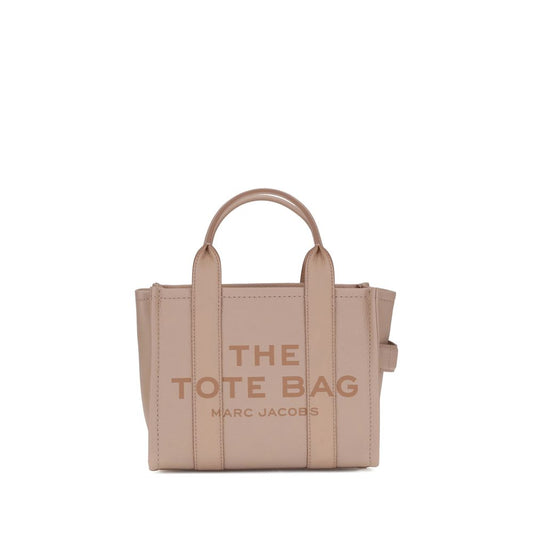 Marc Jacobs The Small Tote Handbag in beige leather with top handles and logo, featuring a sleek design and secure zippered closure.