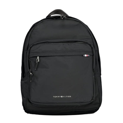 Tommy Hilfiger Black Polyester Backpack with handle, adjustable straps, two external pockets, laptop compartment, and zip closure.
