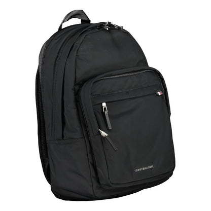 Tommy Hilfiger Black Polyester Backpack with handle, adjustable straps, external pockets, laptop compartment, and logo detailing.