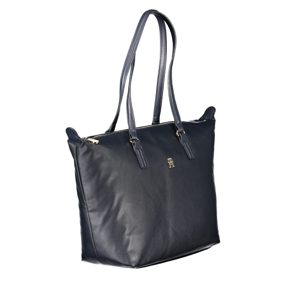 Front view with bag zipped and handles upright.