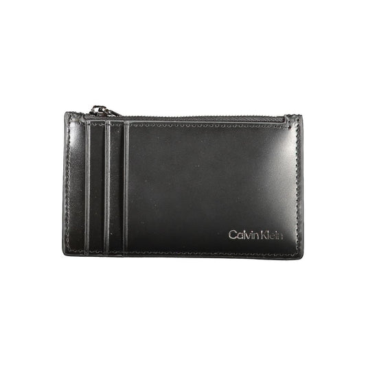Calvin Klein Black Leather Wallet with card holder, central zip pocket, spaces for cards, and logo.