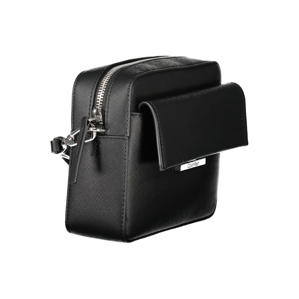 Calvin Klein Black Polyethylene Women Handbag with adjustable strap, snap closure, and pockets for organization.
