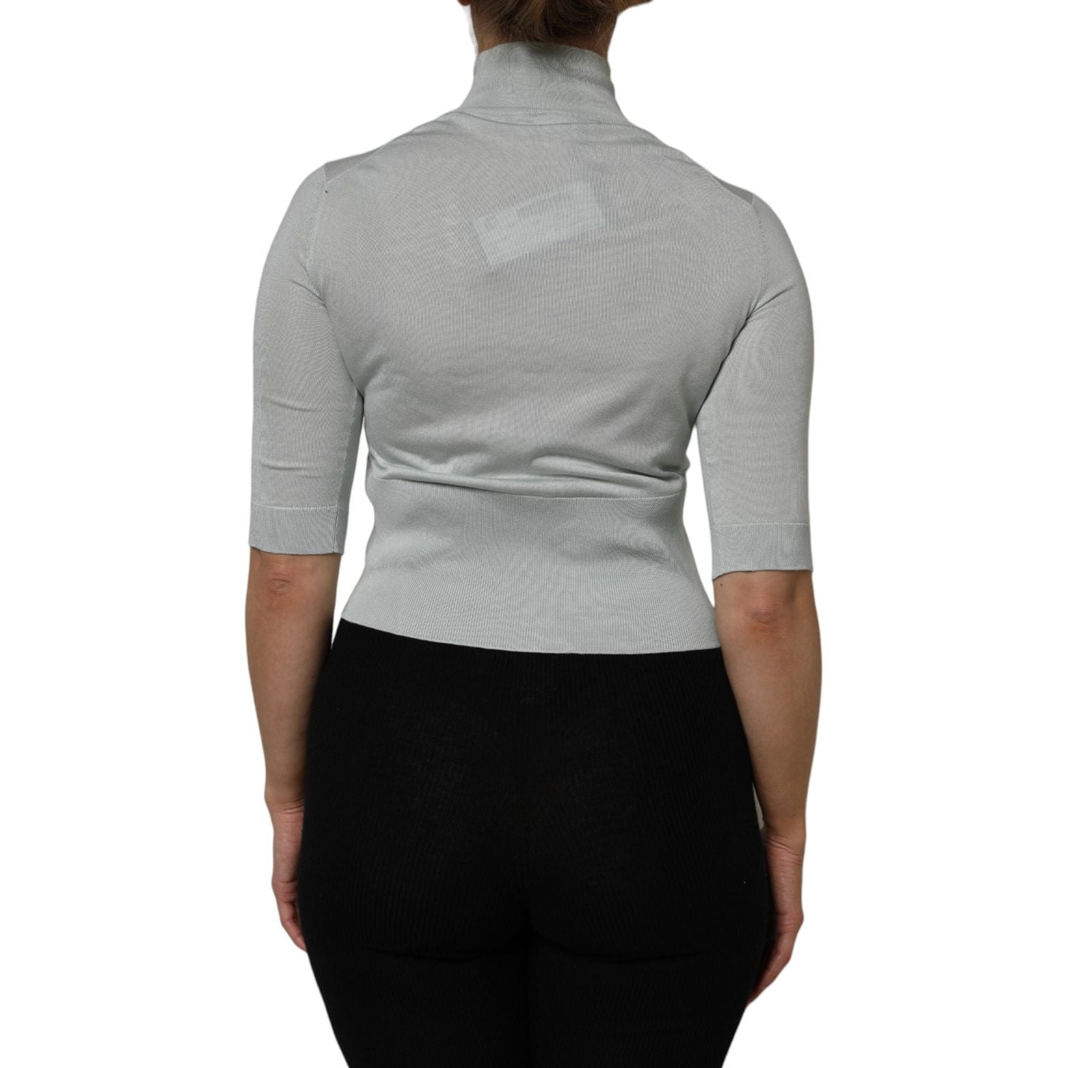 Front view with bag zipped and handles upright.