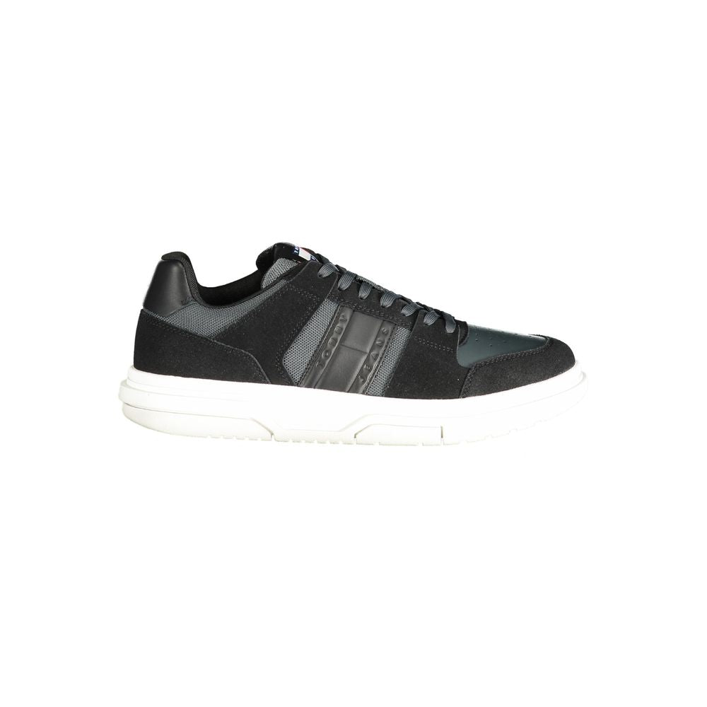 Tommy Hilfiger Black Leather Men Sneaker in sleek design with smoke accents, removable footbed, and iconic logo.