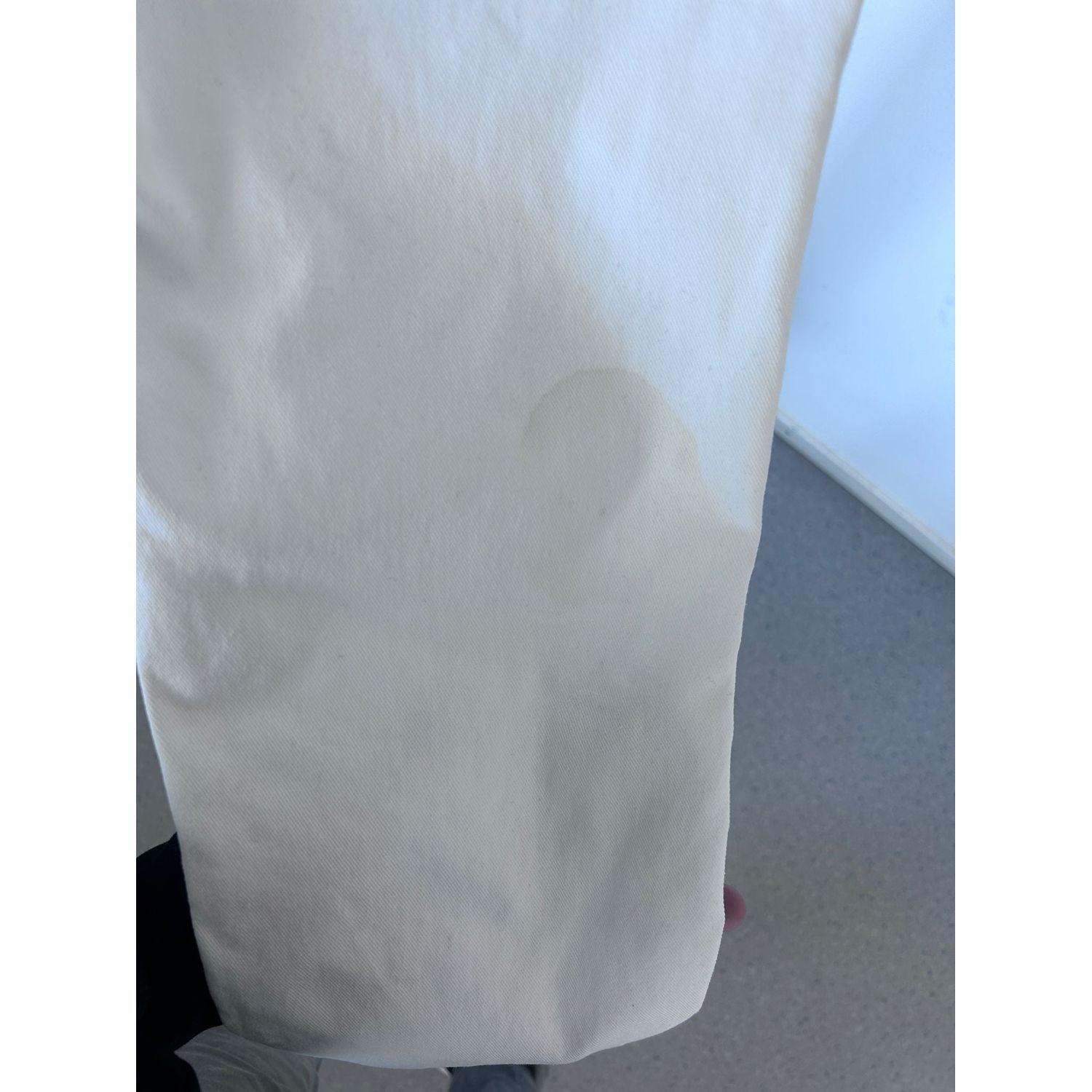 Front view with bag zipped and handles upright.