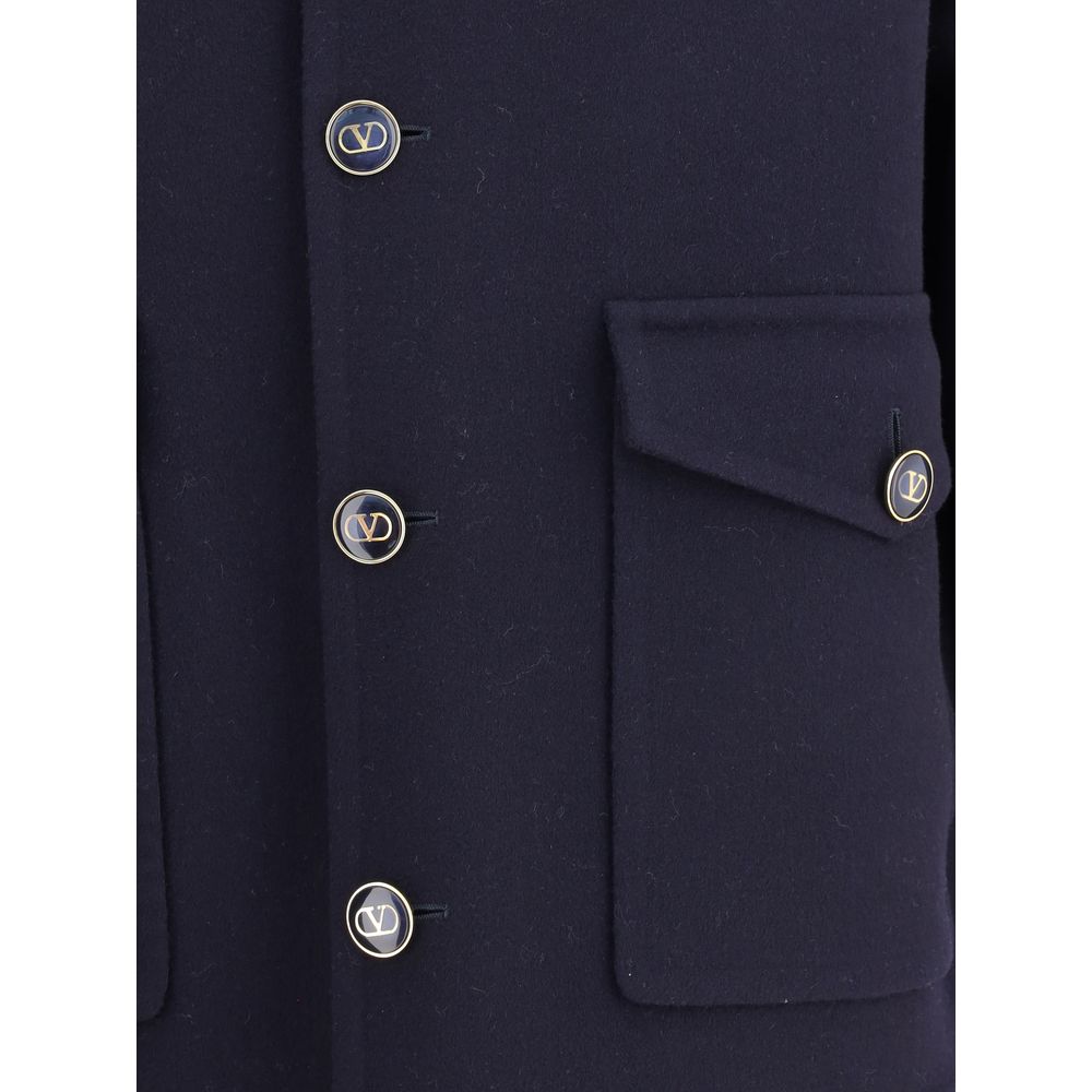 Valentino Blue Fleece Wool Coat with classic collar, button closure, and patch pockets, ideal for elegant or refined casual looks.