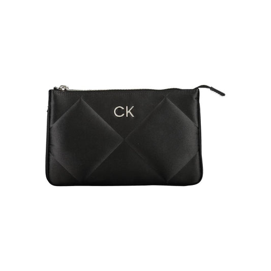 Calvin Klein Black Polyester Handbag with adjustable strap, two compartments, and zip closure, featuring contrasting details and internal card pocket.