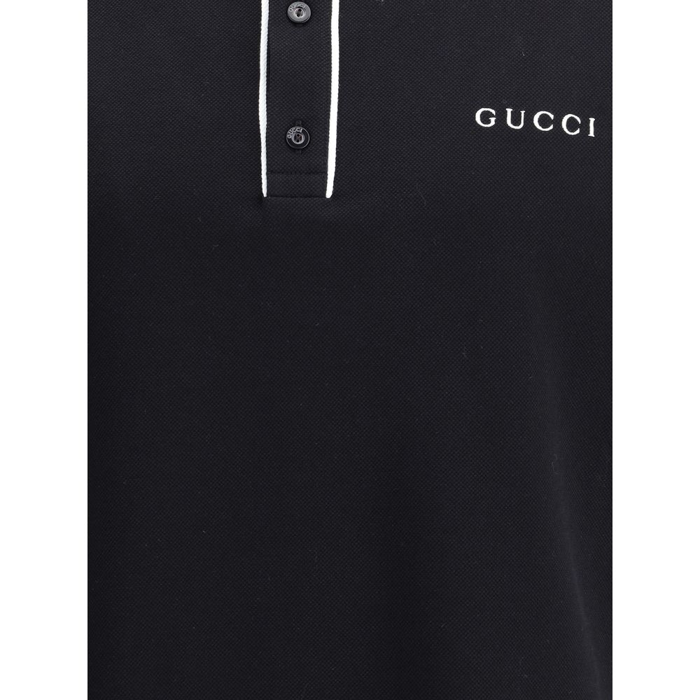 Gucci Black Cotton Polo Shirt with classic collar, buttoned front, and iconic monogram detailing for a sporty elegant look.