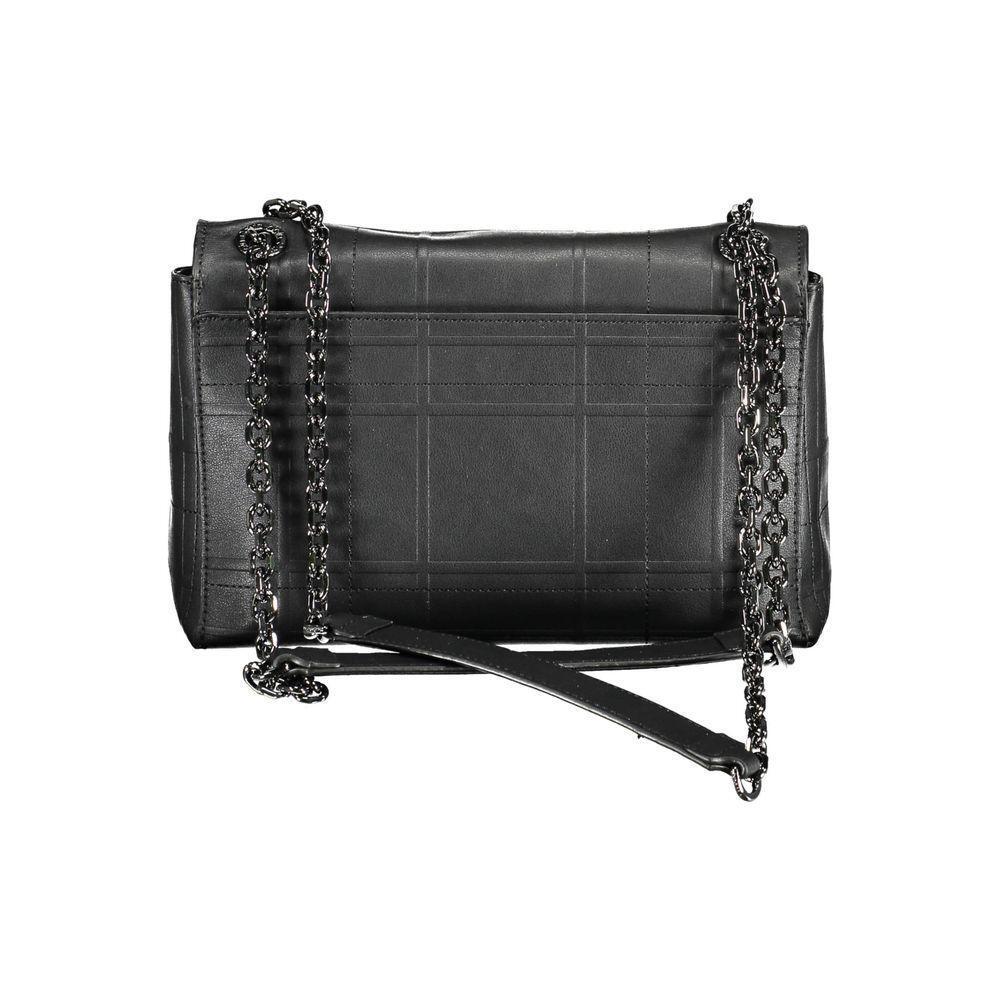 Front view with bag zipped and handles upright.