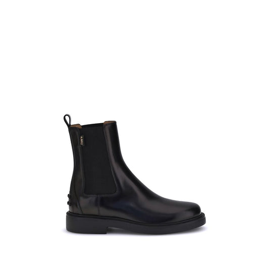Tod's Black Calf Leather Bos Taurus Chelsea Boots with elastic inserts and rubber sole with pebbles for comfort and grip.