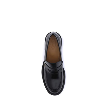 Top view of Tod's Black Calf Leather Bos Taurus Platform Loafers with round toe and chunky heel.