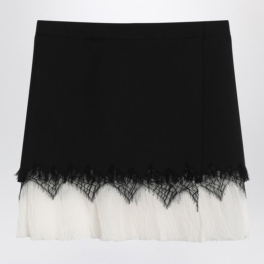 Alexander McQueen Mini skirt with black/ivory spider lace