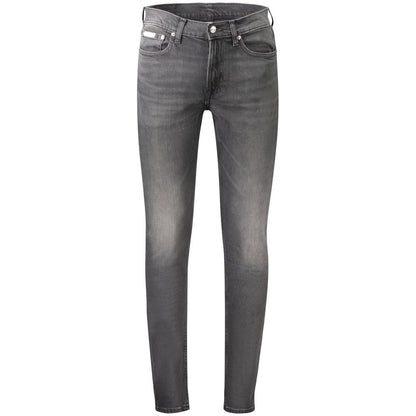 Calvin Klein Black Cotton Men's Slim Taper Jeans with washed effect and iconic logo detailing, showcasing timeless casual elegance.