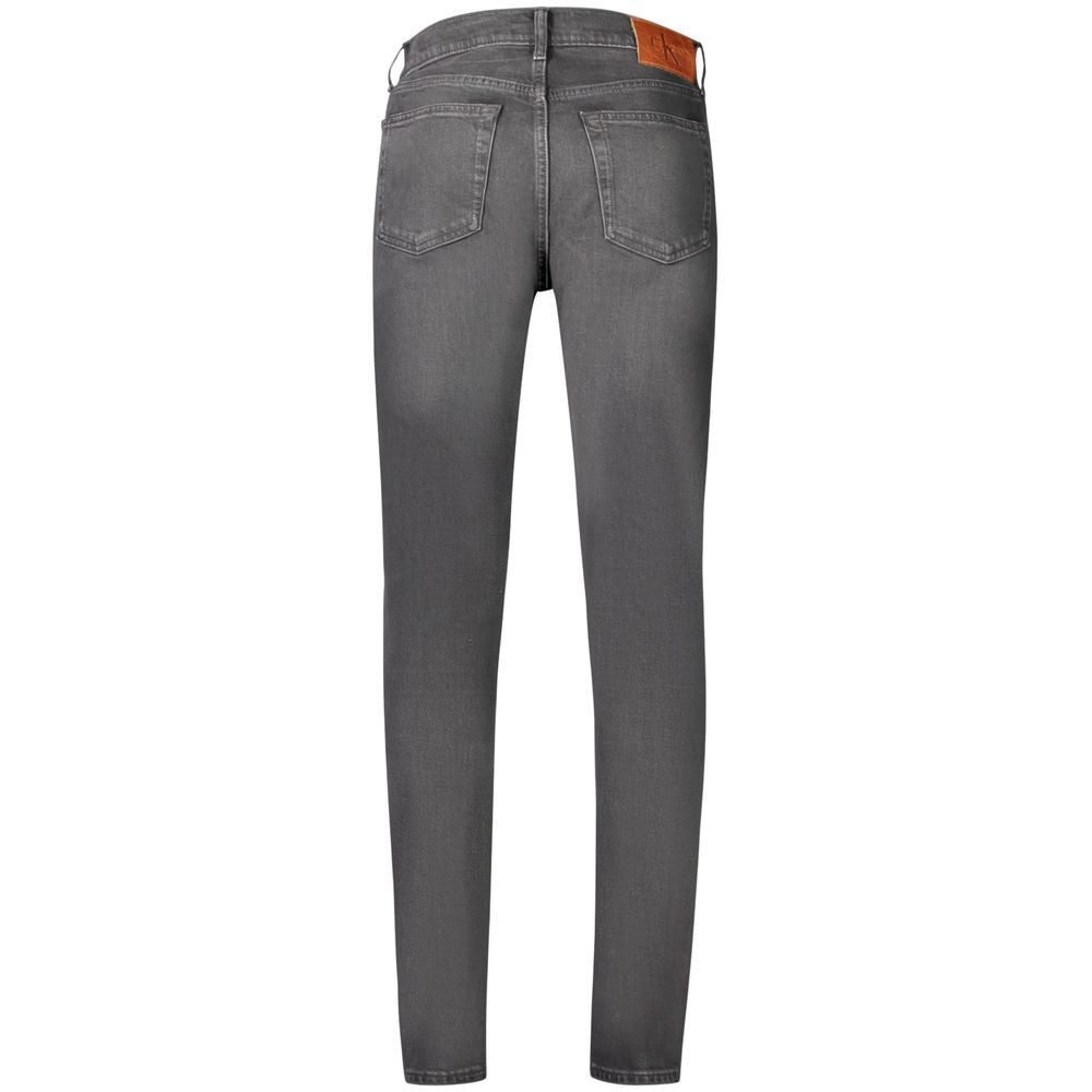 Back view of Calvin Klein Black Cotton Men's Slim Taper Jeans with washed effect and five-pocket design.