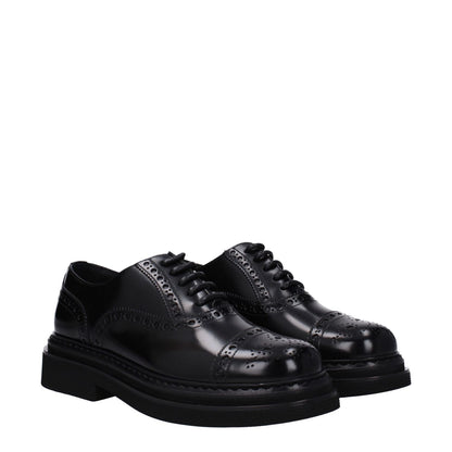 Dolce & Gabbana Black Leather Oxfords And Derbies lace-up vintage effect shoes with round toes and mid heels.