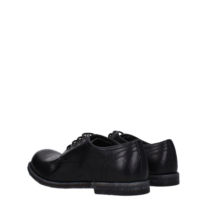 Dolce & Gabbana Black Leather Oxfords And Derbies with vintage style and distressed details.