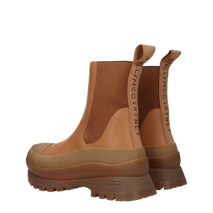 Stella McCartney Brown Leather Ankle Boots with eco-friendly materials, mid heels, rubber sole, and back logo detail, side view.