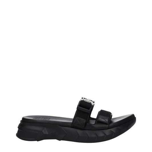 Givenchy Black Fabric Slippers with open toe and mid heels, featuring front logo, silver details, and rubber sole. MPN: BH301QH1A2001.