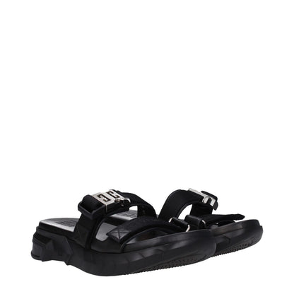 Givenchy Black Fabric Slippers with silver clip closure and rubber sole, featuring an open toe and mid heels, model BH301QH1A2001.