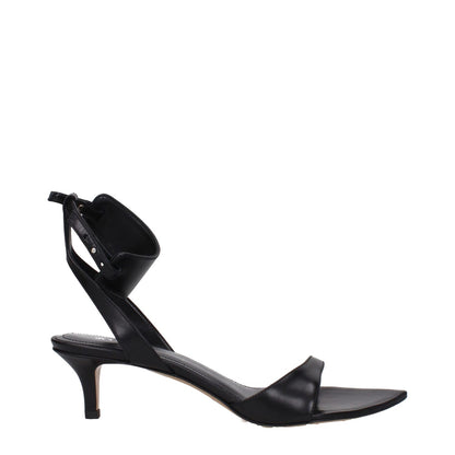 Isabel Marant Black Leather Flat Sandals with buckle closure and mid heels, featuring an open toe design, side view.