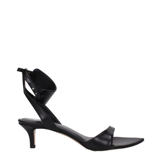 Isabel Marant Black Leather Flat Sandals with buckle closure and mid heels, featuring an open toe design, side view.