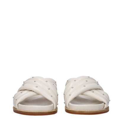 Fabiana Filippi Beige Leather Slippers with studs, open toe, and rubber sole. Casual style, low flat heel, ivory accent.