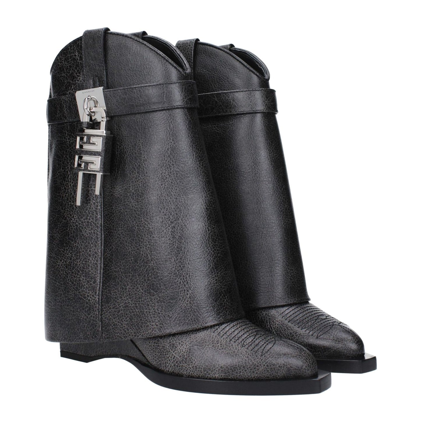 Givenchy Black Leather Ankle Boots with vintage effect, pointy toe, wedge heel, and silver side detail.