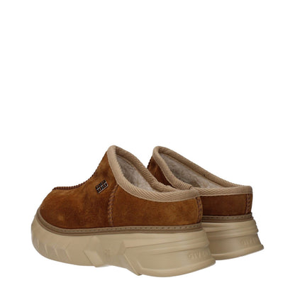 Givenchy Brown Leather Slippers with suede design, side logo, and rubber sole, featuring 4.5 cm mid heels and round toe.