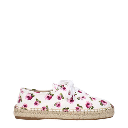 Prada White Fabric Espadrilles in floral design with front logo detailing, side view.