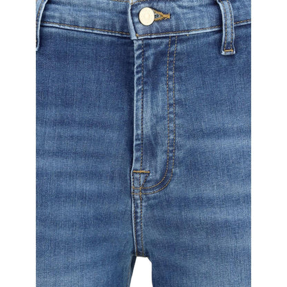 Close-up of 7FOR Blue Cotton Flared Jeans featuring front zipper, button closure, and waist loops for modern silhouette.