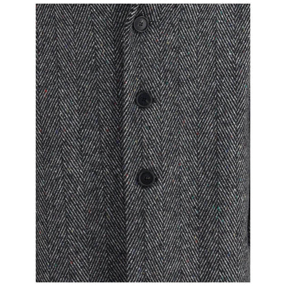 Close-up of herringbone pattern on Givenchy Gray Wool Coat with button fastening, showcasing elegant design and craftsmanship.