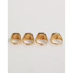 Dolce & Gabbana Gold Tone Brass JAZZ Letter Set 4 Pieces Adjustable Ring displayed in a row, showcasing luxurious gold design.