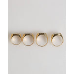 Dolce & Gabbana Gold Tone Brass JAZZ Letter Set 4 Pieces Adjustable Ring displayed on a white background.