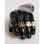 Dolce & Gabbana Gold Tone Brass JAZZ Letter Set 4 Pieces Adjustable Ring on mannequin hand